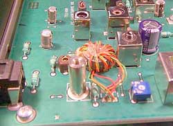 Fig 2--The RF PC board after modification and the new transformer hot glued to the board.